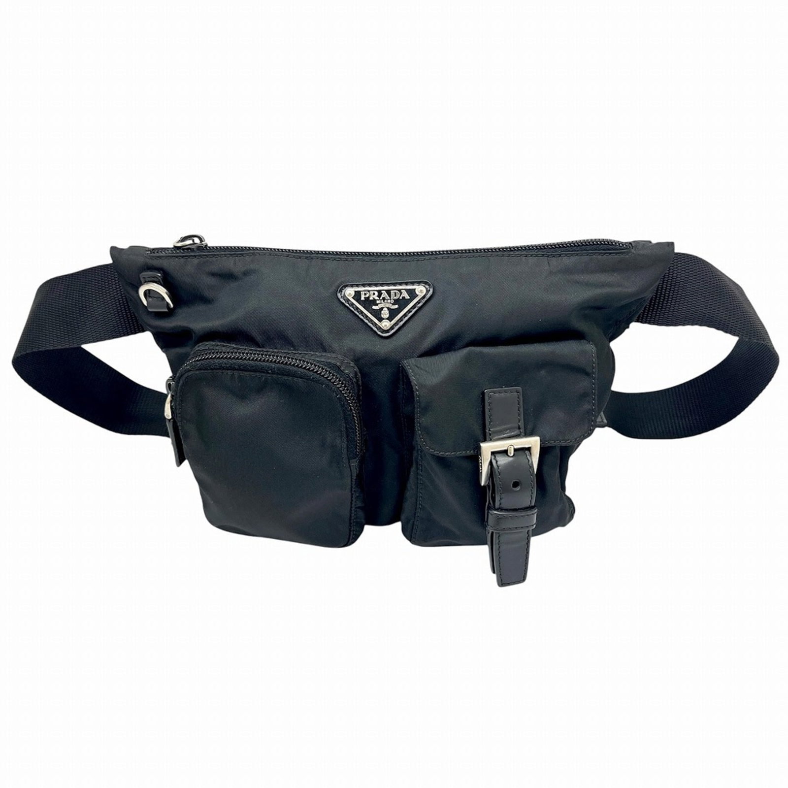 Fanny Pack Nylon by Prada: Fanny Pack Nylon by Prada Prada's Fanny Pack Nylon is a sleek and versatile accessory, crafted from durable nylon material in a striking black color. Measuring 24cm x 17cm x 4cm, it features a