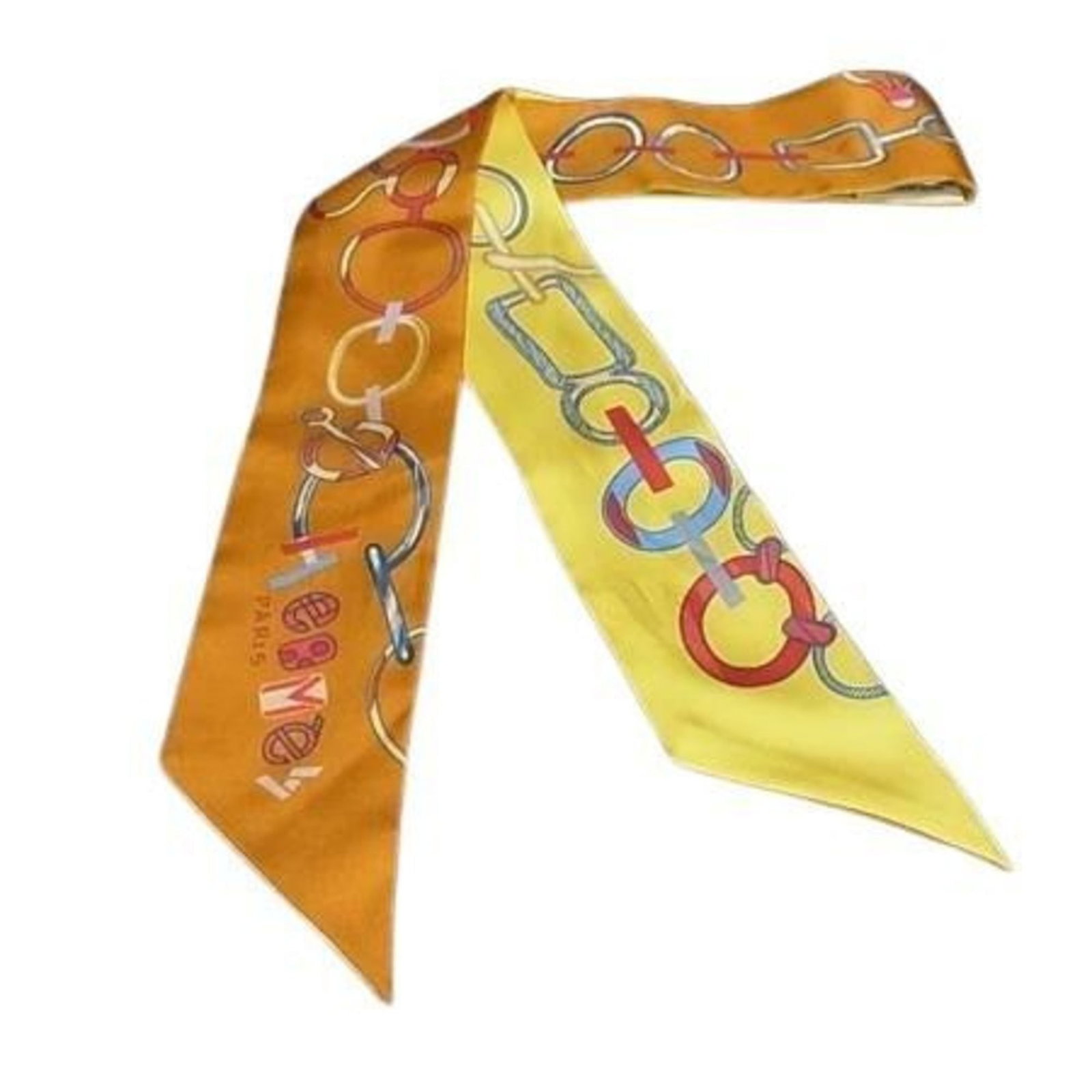 Silk 100% by Hermes: Silk 100% by Hermes Silk Twilly scarf from the iconic Hermes brand, crafted in France with 100% silk material. This vibrant multi-color design showcases the signature style of the French luxury fashio