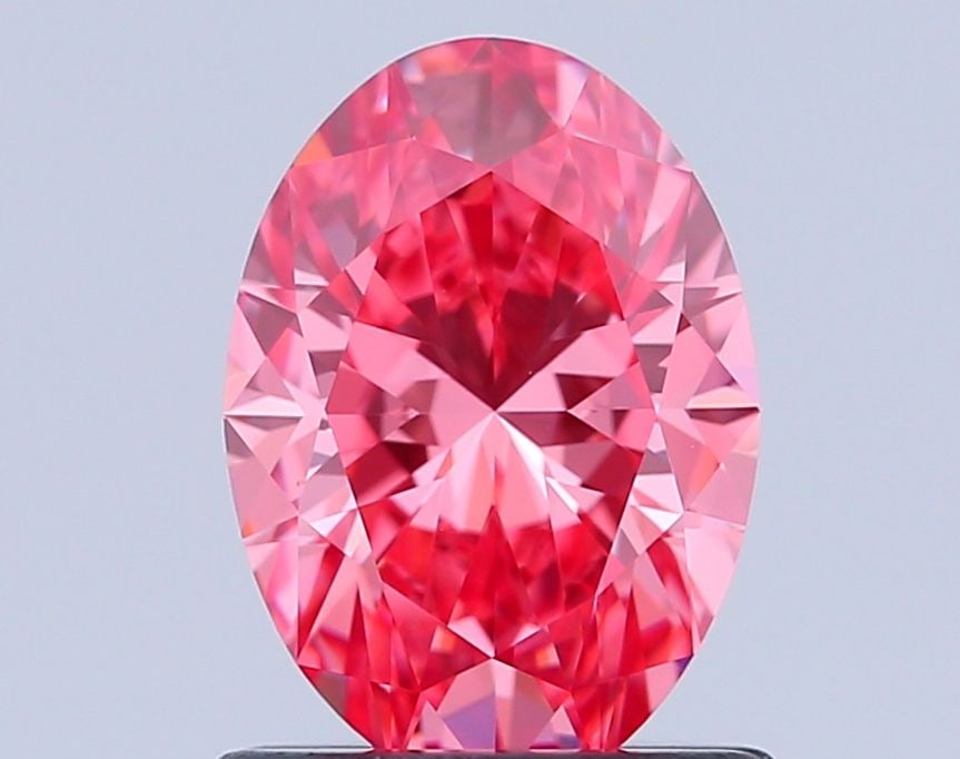 IGI Oval 1.05ct Fancy Vivid Pink VVS2 - Loose Lab Diamond: IGI Oval 1.05ct Fancy Vivid Pink VVS2 - Loose Lab Diamond Item Specifics: Source: This Is A Real Diamond Grown In A Lab Not Mined. Carat: 1.05 Cut: - Color: Fancy Vivid Pink Clarity: VVS2 Polish: EX