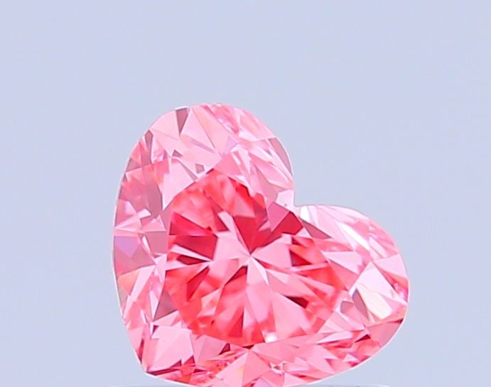 IGI Heart 0.9ct Fancy Vivid Pink VVS2 - Loose Lab Diamond: IGI Heart 0.9ct Fancy Vivid Pink VVS2 - Loose Lab Diamond Item Specifics: Source: This Is A Real Diamond Grown In A Lab Not Mined. Carat: 0.9 Cut: - Color: Fancy Vivid Pink Clarity: VVS2 Polish: VG Sy