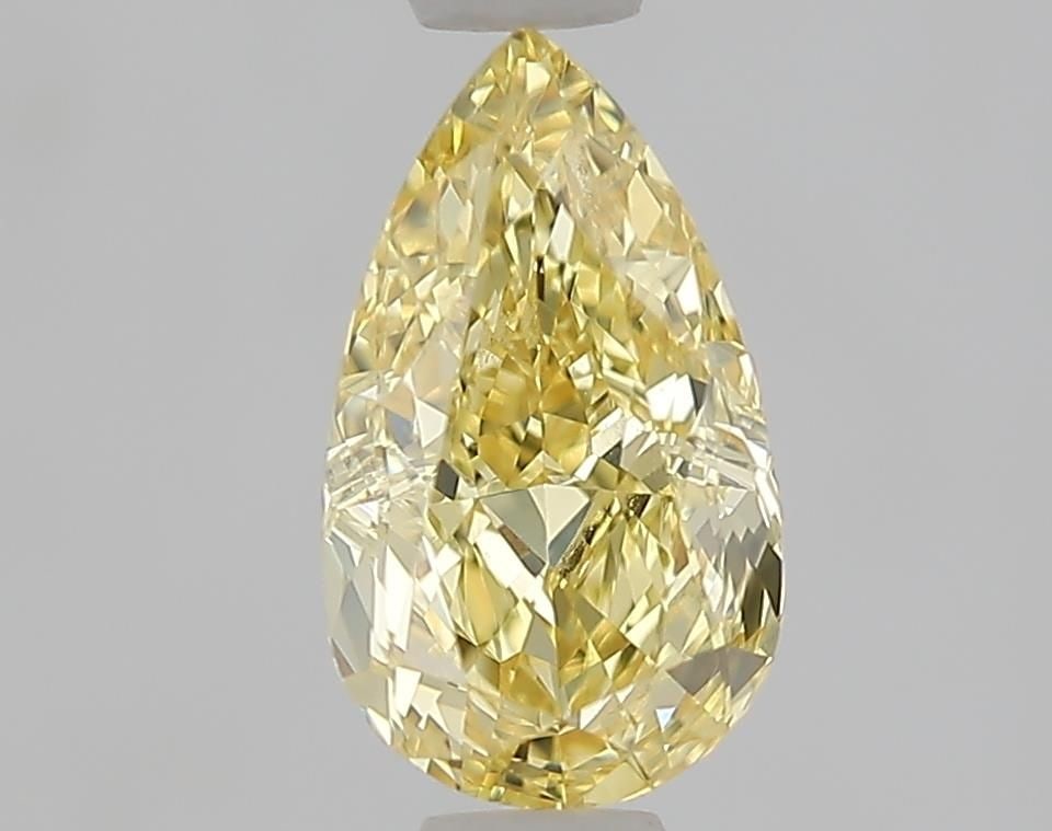 IGI Pear 1.03ct Fancy Yellow VVS2 - Loose Lab Diamond: IGI Pear 1.03ct Fancy Yellow VVS2 - Loose Lab Diamond Item Specifics: Source: This Is A Real Diamond Grown In A Lab Not Mined. Carat: 1.03 Cut: - Color: Fancy Yellow Clarity: VVS2 Polish: EX Symmetry: