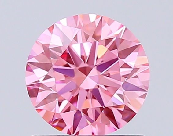 IGI Round 1.0ct Fancy Vivid Pink VVS2 - Ideal Loose Lab Diamond: IGI Round 1.0ct Fancy Vivid Pink VVS2 - Ideal Loose Lab Diamond Item Specifics: Source: This Is A Real Diamond Grown In A Lab Not Mined. Carat: 1.0 Cut: ID Color: Fancy Vivid Pink Clarity: VVS2 Polish