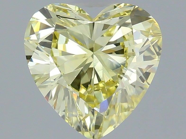 IGI Heart 1.55ct Fancy Intense Yellow VVS2 - Loose Lab Diamond: IGI Heart 1.55ct Fancy Intense Yellow VVS2 - Loose Lab Diamond Item Specifics: Source: This Is A Real Diamond Grown In A Lab Not Mined. Carat: 1.55 Cut: - Color: Fancy Intense Yellow Clarity: VVS2 Pol