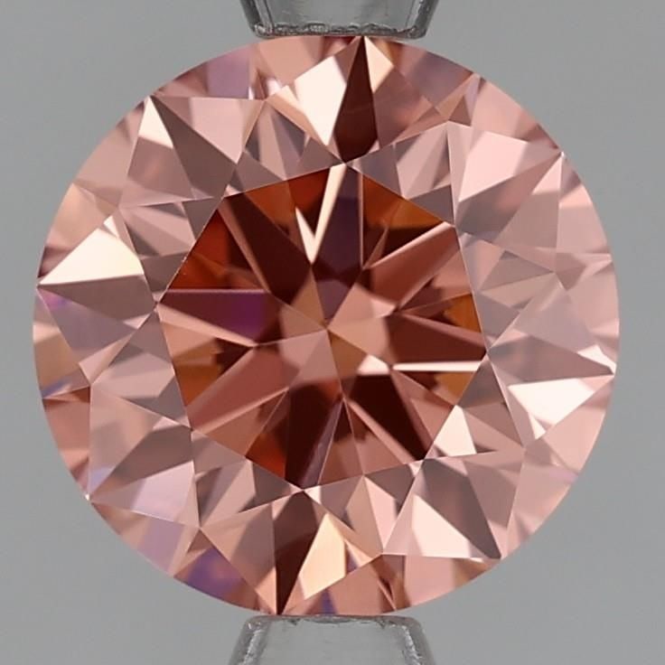 Round 1.36ct Fancy Orangey Pink VVS1 - Loose Lab Diamond: Round 1.36ct Fancy Orangey Pink VVS1 - Loose Lab Diamond Item Specifics: Source: This Is A Real Diamond Grown In A Lab Not Mined. Carat: 1.36 Cut: EX Color: Fancy Orangey Pink Clarity: VVS1 Polish: VG