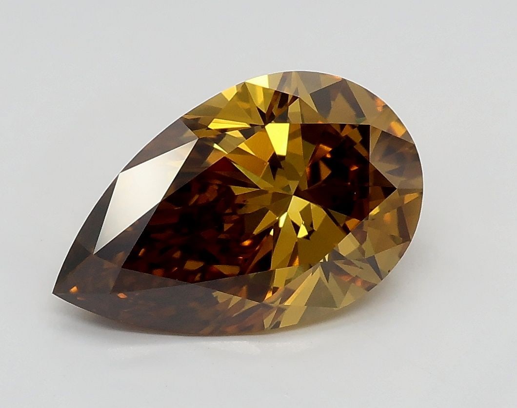 IGI Pear 1.81ct Fancy Brownish Yellow VVS2 - Loose Lab Diamond: IGI Pear 1.81ct Fancy Brownish Yellow VVS2 - Loose Lab Diamond Item Specifics: Source: This Is A Real Diamond Grown In A Lab Not Mined. Carat: 1.81 Cut: - Color: Fancy Brownish Yellow Clarity: VVS2 Po