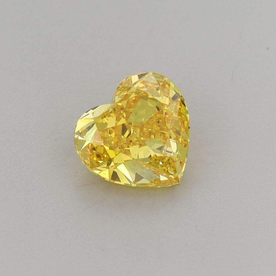 IGI Heart 1.31ct Fancy Vivid Yellow VVS2 - Loose Lab Diamond: IGI Heart 1.31ct Fancy Vivid Yellow VVS2 - Loose Lab Diamond Item Specifics: Source: This Is A Real Diamond Grown In A Lab Not Mined. Carat: 1.31 Cut: - Color: Fancy Vivid Yellow Clarity: VVS2 Polish: