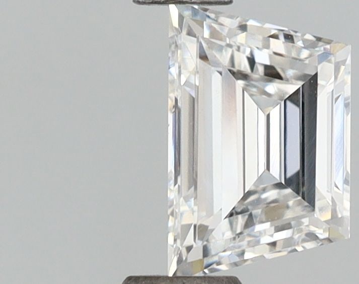 IGI Trapezoid 0.71ct D VVS2 - Loose Lab Diamond: IGI Trapezoid 0.71ct D VVS2 - Loose Lab Diamond Item Specifics: Source: This Is A Real Diamond Grown In A Lab Not Mined. Carat: 0.71 Cut: - Color: D Clarity: VVS2 Polish: VG Symmetry: VG Measurements: