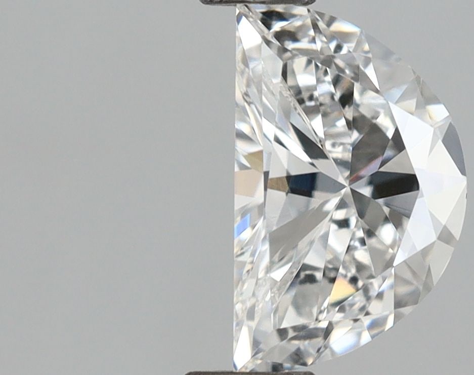 IGI Half Moon 0.72ct E VVS2 - Loose Lab Diamond: IGI Half Moon 0.72ct E VVS2 - Loose Lab Diamond Item Specifics: Source: This Is A Real Diamond Grown In A Lab Not Mined. Carat: 0.72 Cut: - Color: E Clarity: VVS2 Polish: VG Symmetry: VG Measurements:
