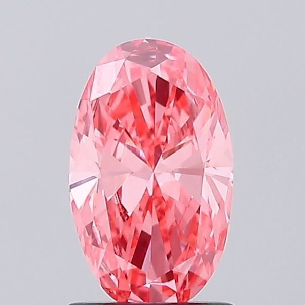 IGI Oval 1.1ct Fancy Vivid Pink VVS2 - Loose Lab Diamond: IGI Oval 1.1ct Fancy Vivid Pink VVS2 - Loose Lab Diamond Item Specifics: Source: This Is A Real Diamond Grown In A Lab Not Mined. Carat: 1.1 Cut: - Color: Fancy Vivid Pink Clarity: VVS2 Polish: VG Sym