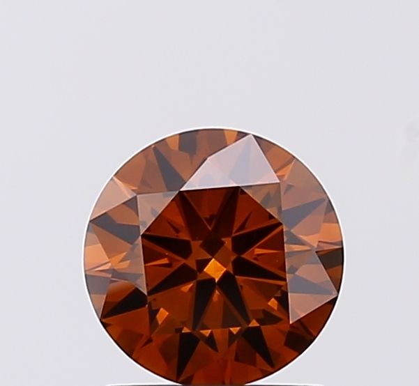 IGI Round 0.95ct Fancy Brown VVS2 - Ideal Loose Lab Diamond: IGI Round 0.95ct Fancy Brown VVS2 - Ideal Loose Lab Diamond Item Specifics: Source: This Is A Real Diamond Grown In A Lab Not Mined. Carat: 0.95 Cut: ID Color: Fancy Brown Clarity: VVS2 Polish: EX Sym