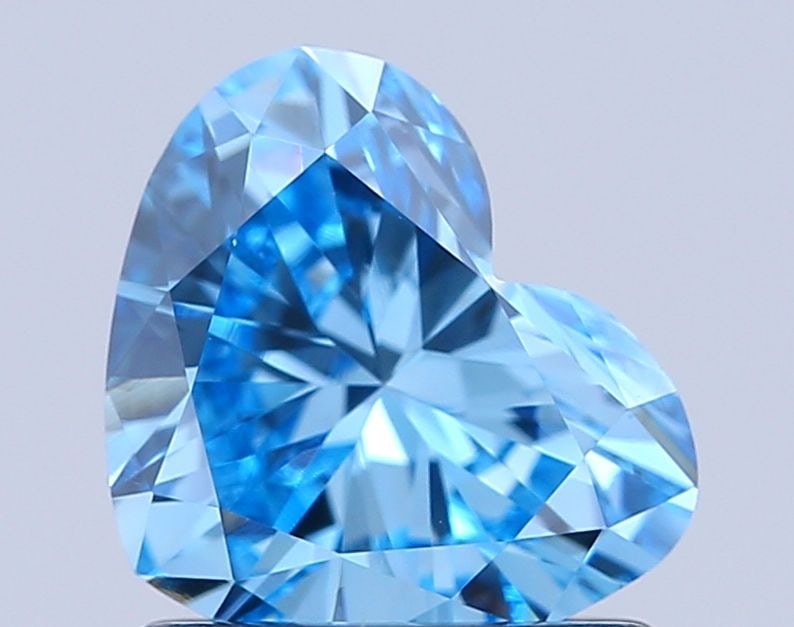 IGI Heart 1.0ct Fancy Vivid Blue VVS2 - Loose Lab Diamond: IGI Heart 1.0ct Fancy Vivid Blue VVS2 - Loose Lab Diamond Item Specifics: Source: This Is A Real Diamond Grown In A Lab Not Mined. Carat: 1.0 Cut: - Color: Fancy Vivid Blue Clarity: VVS2 Polish: VG Sy