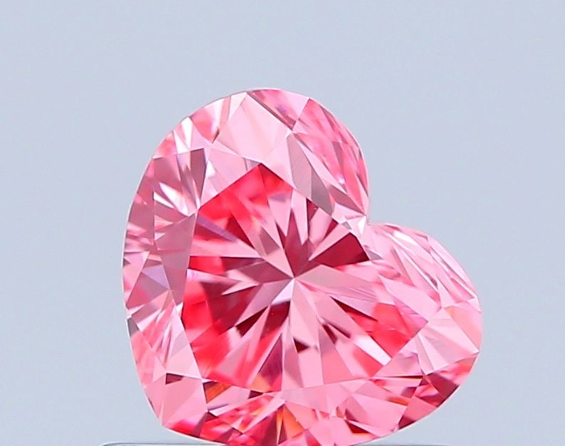 IGI Heart 0.87ct Fancy Vivid Pink VVS2 - Loose Lab Diamond: IGI Heart 0.87ct Fancy Vivid Pink VVS2 - Loose Lab Diamond Item Specifics: Source: This Is A Real Diamond Grown In A Lab Not Mined. Carat: 0.87 Cut: - Color: Fancy Vivid Pink Clarity: VVS2 Polish: VG 