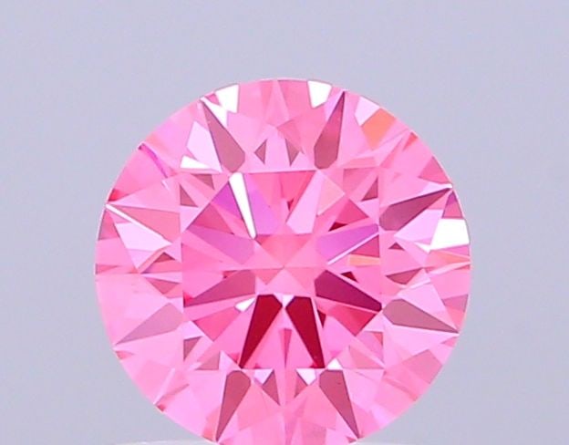 IGI Round 1.1ct Fancy Vivid Pink VVS2 - Ideal Loose Lab Diamond: IGI Round 1.1ct Fancy Vivid Pink VVS2 - Ideal Loose Lab Diamond Item Specifics: Source: This Is A Real Diamond Grown In A Lab Not Mined. Carat: 1.1 Cut: ID Color: Fancy Vivid Pink Clarity: VVS2