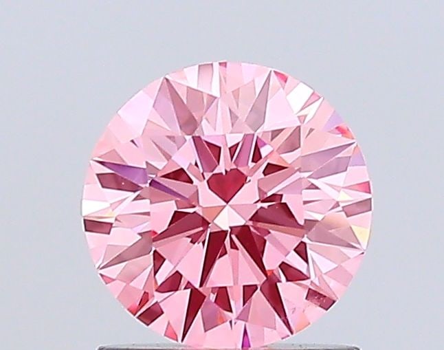 IGI Round 1.03ct Fancy Vivid Pink VVS2 - Ideal Loose Lab Diamond: IGI Round 1.03ct Fancy Vivid Pink VVS2 - Ideal Loose Lab Diamond Item Specifics: Source: This Is A Real Diamond Grown In A Lab Not Mined. Carat: 1.03 Cut: ID Color: Fancy Vivid Pink Clarity: VVS2 Poli