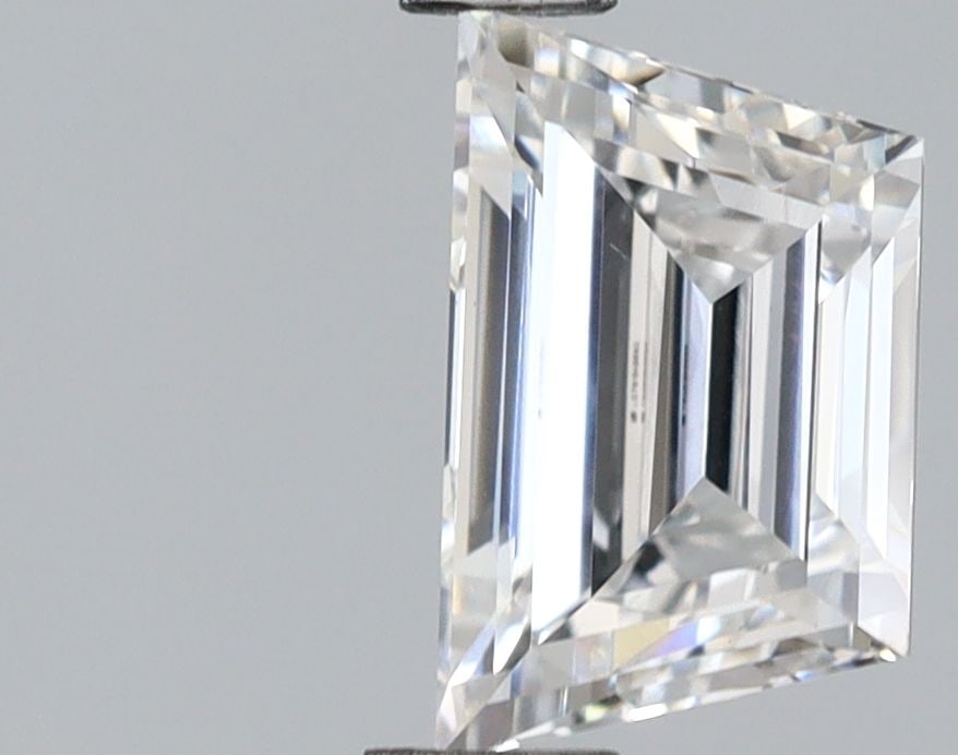 IGI Trapezoid 0.65ct D VVS2 - Loose Lab Diamond: IGI Trapezoid 0.65ct D VVS2 - Loose Lab Diamond Item Specifics: Source: This Is A Real Diamond Grown In A Lab Not Mined. Carat: 0.65 Cut: - Color: D Clarity: VVS2 Polish: VG Symmetry: VG Measurements: