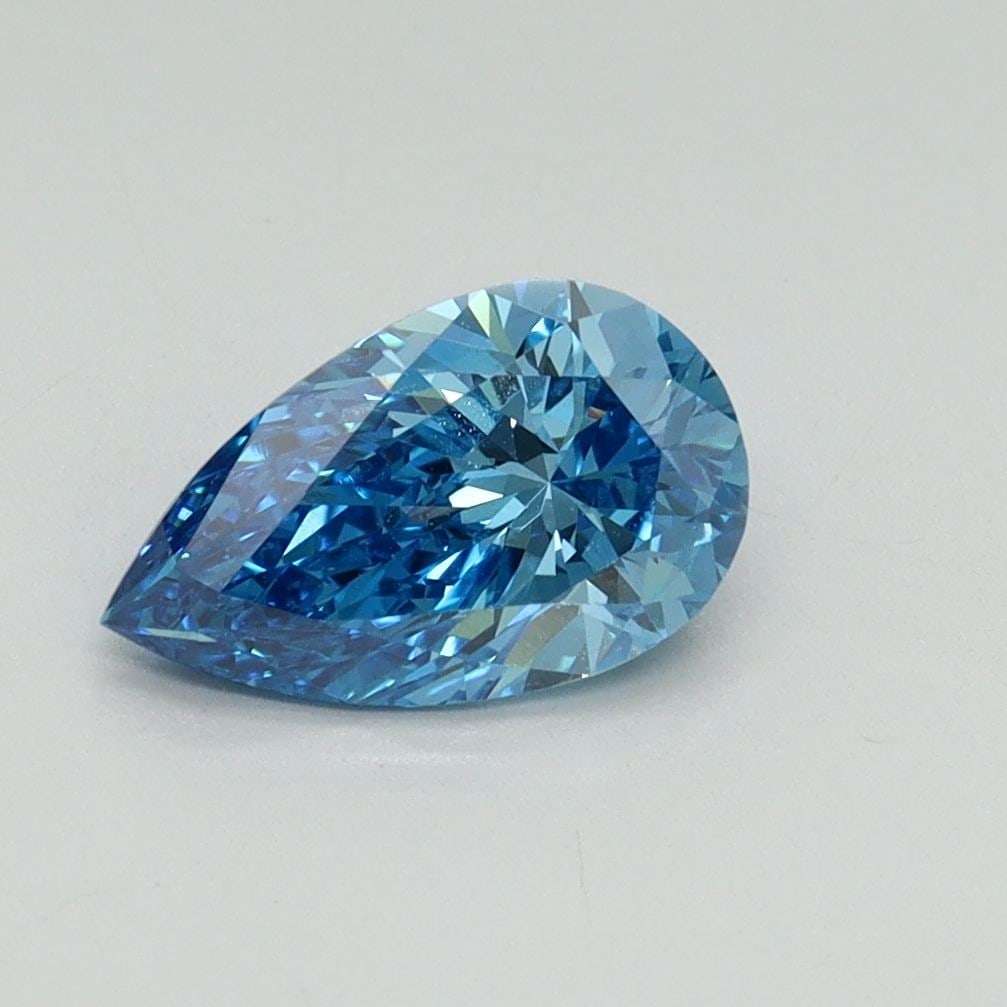 IGI Pear 1.03ct Fancy Vivid Blue VVS2 - Loose Lab Diamond: IGI Pear 1.03ct Fancy Vivid Blue VVS2 - Loose Lab Diamond Item Specifics: Source: This Is A Real Diamond Grown In A Lab Not Mined. Carat: 1.03 Cut: - Color: Fancy Vivid Blue Clarity: VVS2 Polish: EX S