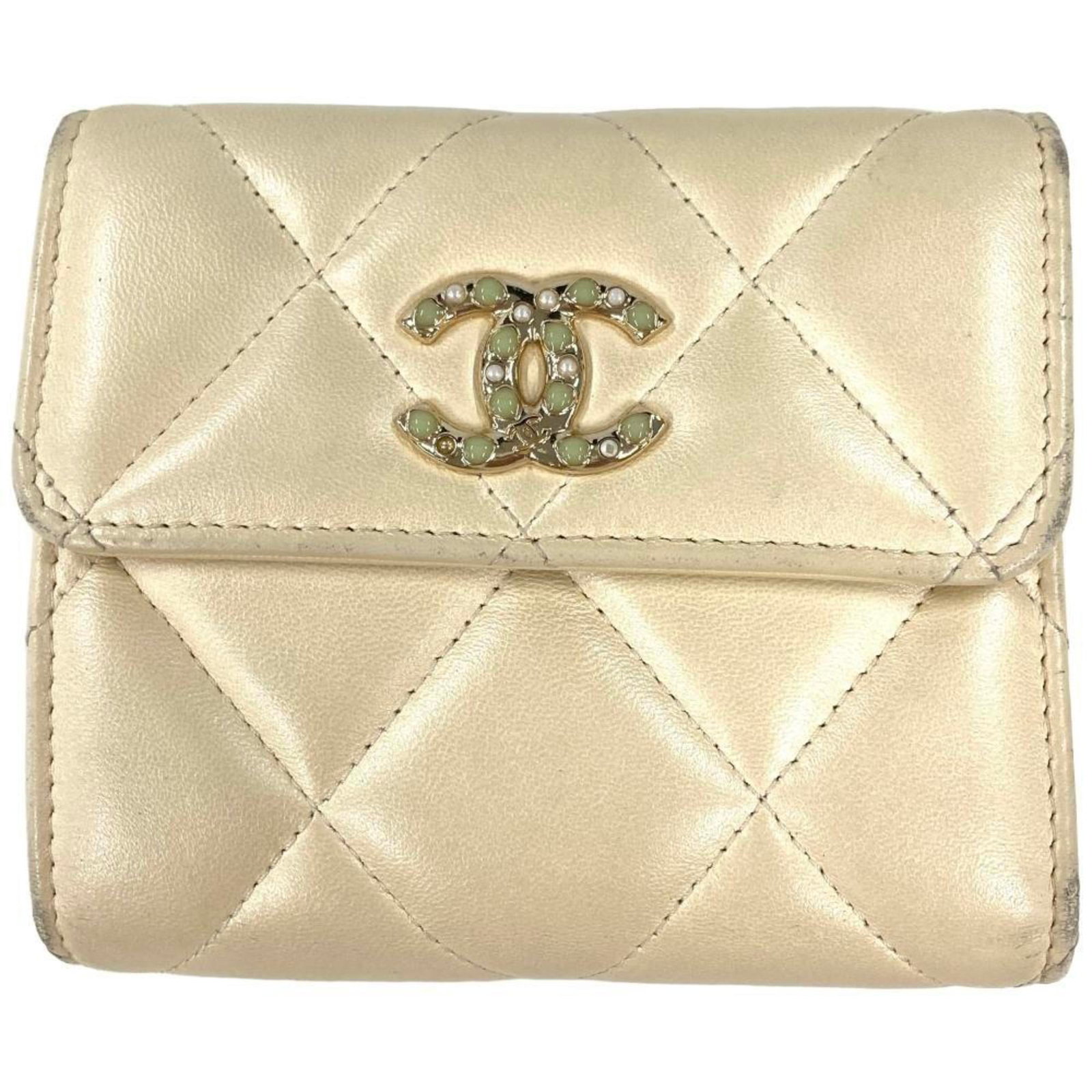 Chanel Wallet (Tri-Fold) Leather: Chanel Wallet (Tri-Fold) Leather The Chanel Wallet (Tri-Fold) Leather is a classic design from Spain, crafted from high-quality lambskin leather. Its sleek white color and tri-fold structure make it