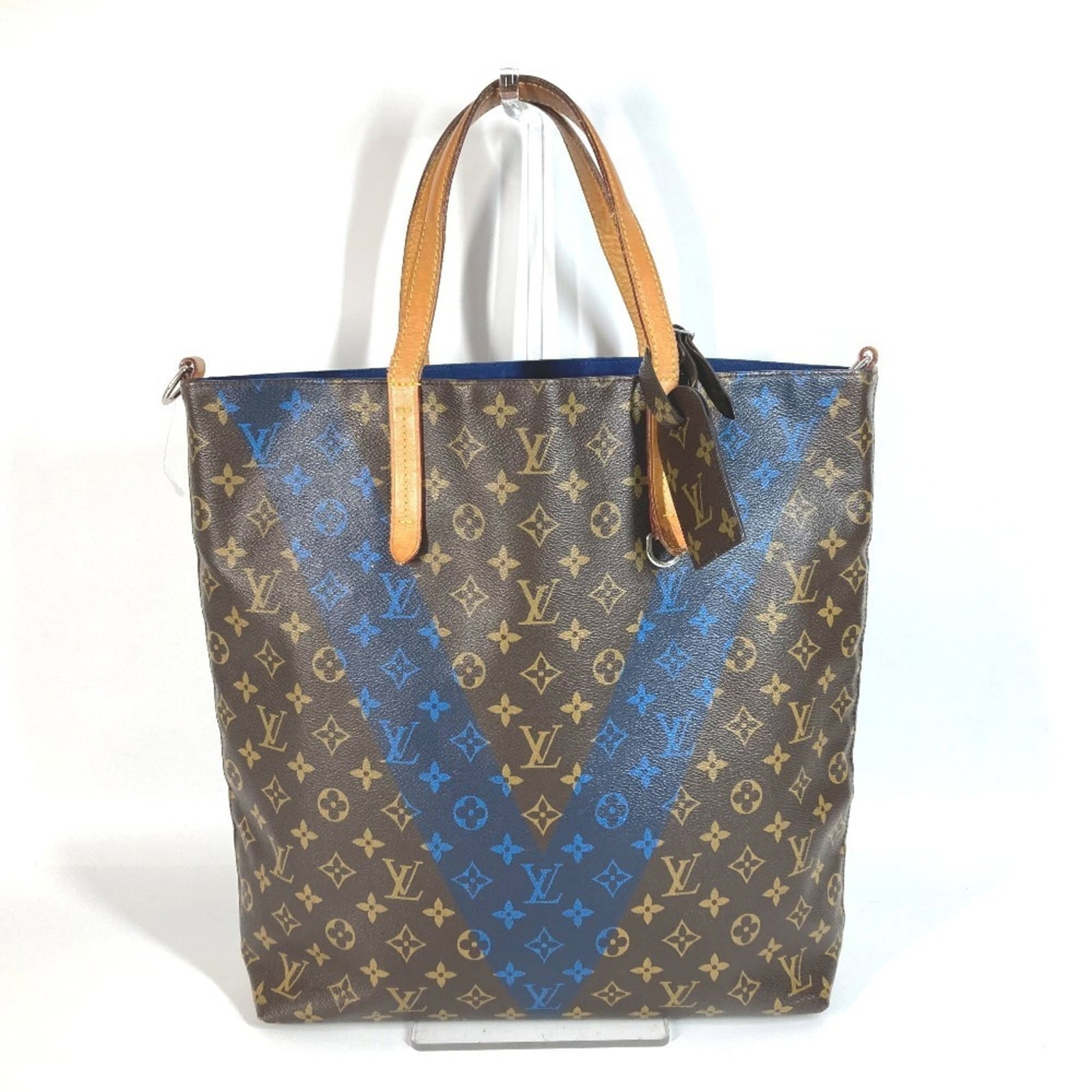 Vuitton Monogram Shoulder Tote Bag Louis: Vuitton Monogram Shoulder Tote Bag Louis Blue, Brown, and Monogram designs adorn the Vuitton Monogram Shoulder Tote Bag Louis, crafted from high-quality materials. Measuring 38cm x 33.5cm x 9cm, this 