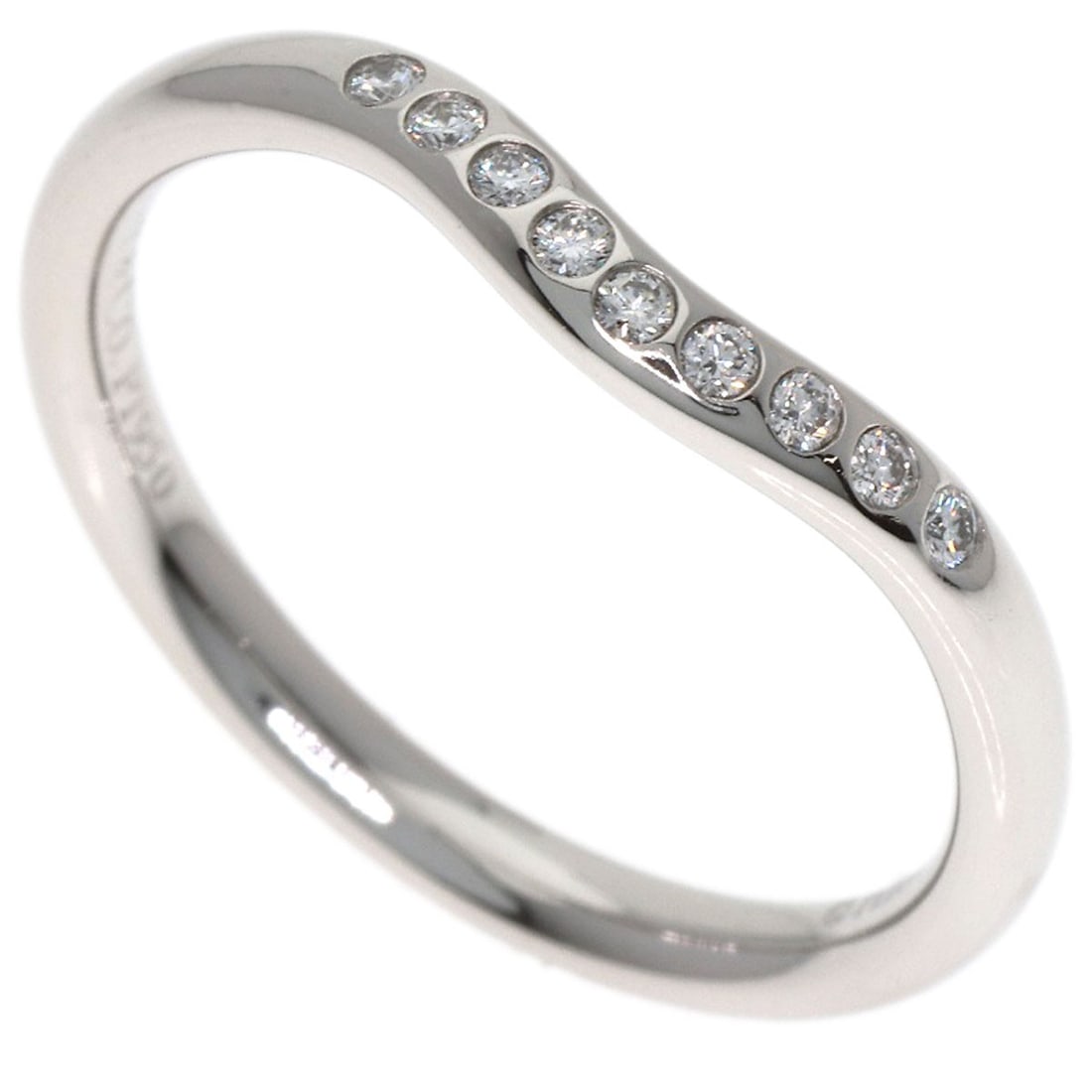 Tiffany&Co. Curved Band Diamond Ring Platinum Pt950: Tiffany&Co. Curved Band Diamond Ring Platinum Pt950 Tiffany&Co.'s Curved Band Diamond Ring showcases a striking silver platinum Pt950 band, adorned with a diamond. The ring's curved design adds a