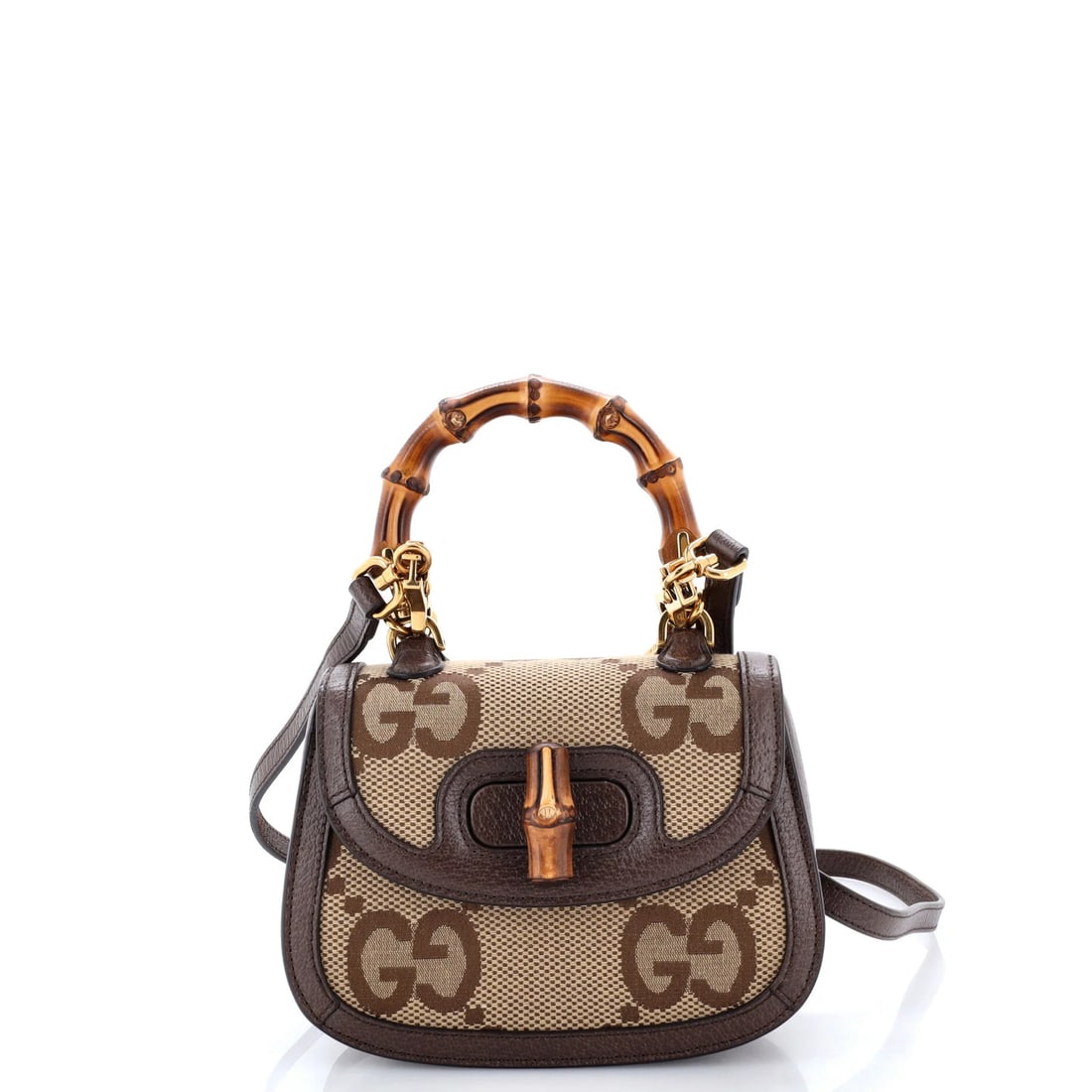 Gucci 1947 bamboo top bag mini jumbo handle GG canvas: Gucci 1947 bamboo top bag mini jumbo handle GG canvas The Gucci 1947 Bamboo Top Handle Bag in brown canvas features the iconic GG logo, adding a touch of timeless elegance to any outfit. With its comp