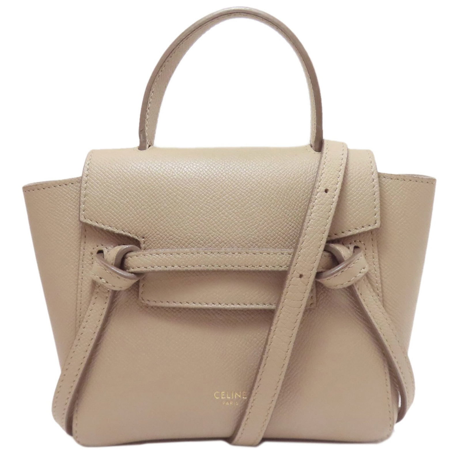 Handbag Celine Leather: Handbag Celine Leather Calfskin leather construction provides durability and sophistication. This beige Celine handbag boasts a classic design with clean lines, while its 16cm handle length offers a c