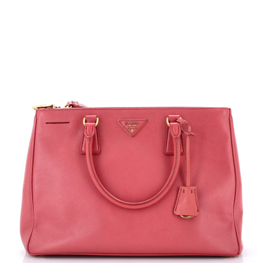 Lux Tote Saffiano Leather Medium double zip by Prada: Lux Tote Saffiano Leather Medium double zip by Prada Pink Saffiano Leather Lux Tote with Double Zip features a medium size, 5" handle drop, and adjustable strap. The exterior has minor touch-ups on