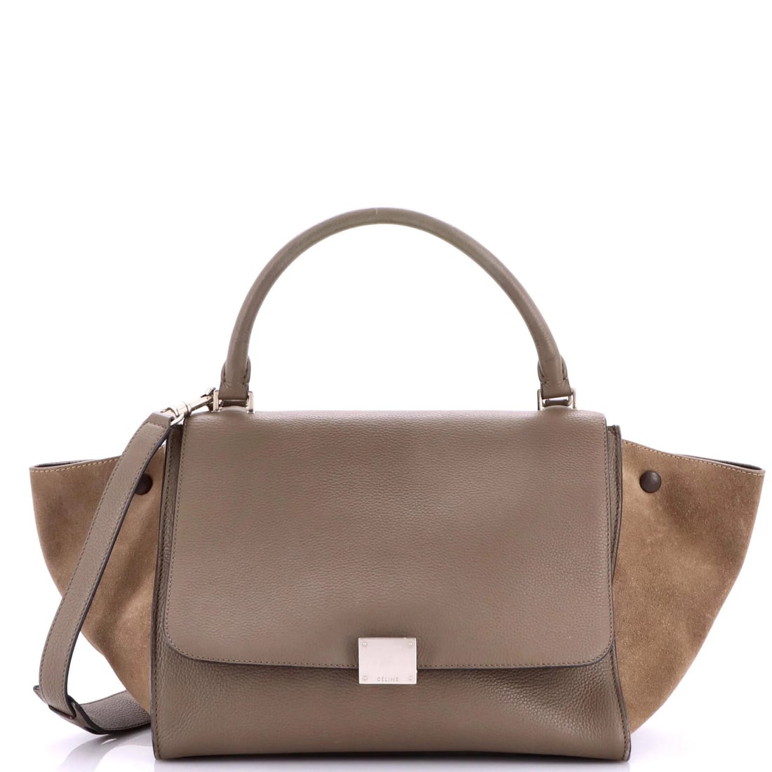Celine Trapeze Bag Leather Medium: Celine Trapeze Bag Leather Medium The Celine Trapeze Bag Leather Medium boasts a sleek gray exterior with rich leather details, complemented by a spacious interior in brown and gray hues. With its cla