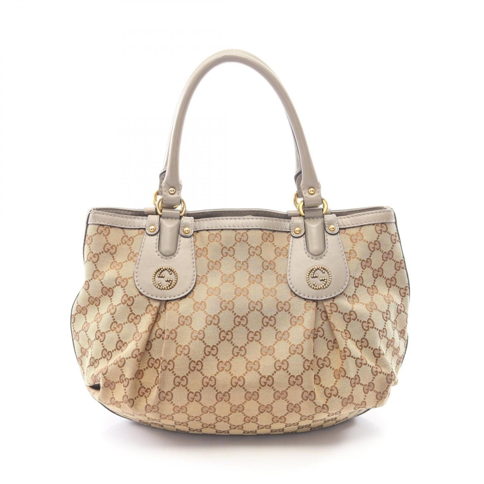 Canvas leather tote bag by Gucci: Canvas leather tote bag by Gucci Canvas leather tote bag by Gucci, featuring a classic beige and gray color combination, boasts a sturdy canvas construction paired with premium leather accents. Measur