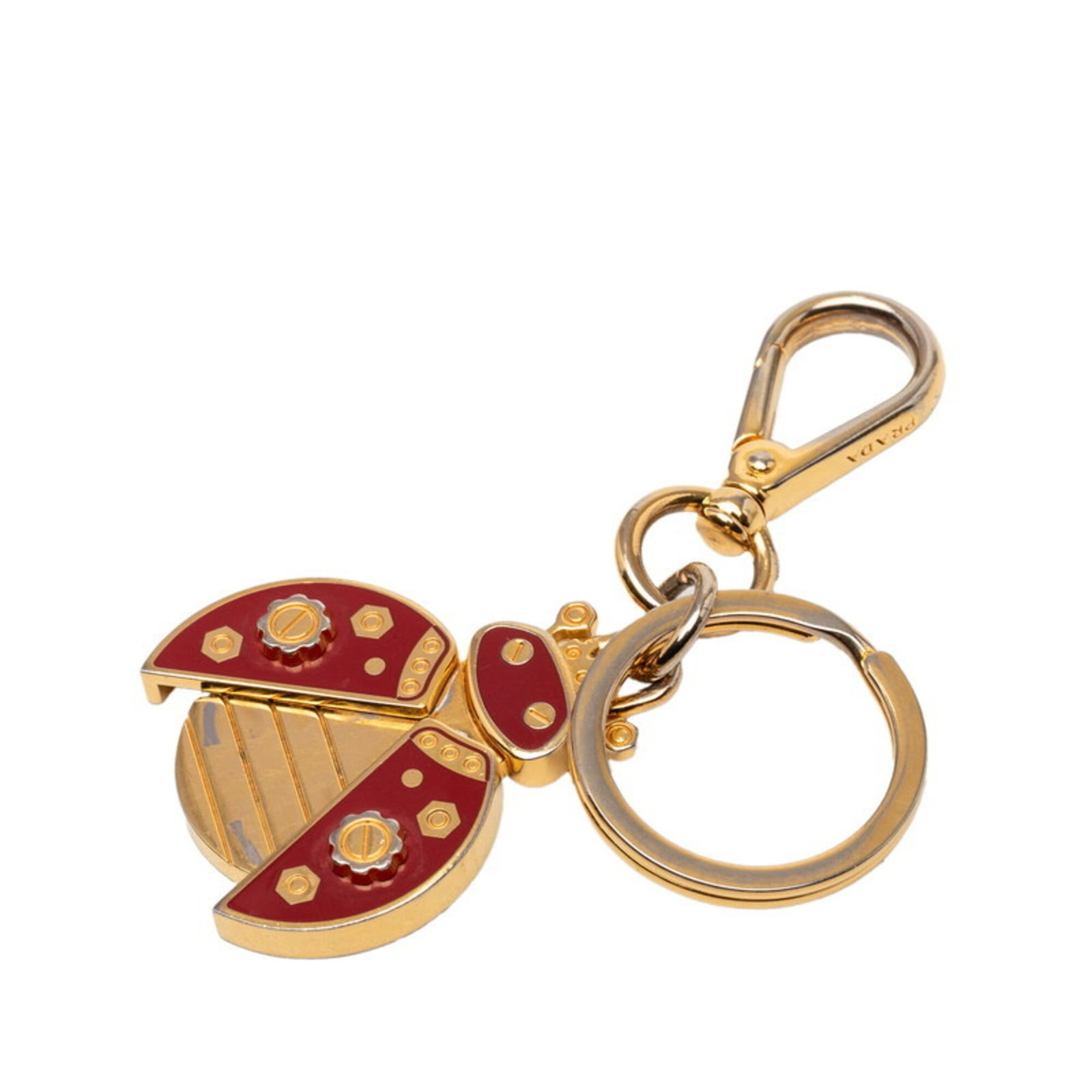 Keyring enamel from Prada: Keyring enamel from Prada Gold enamel keyring from Prada, measuring 8cm x 3cm. This small yet elegant accessory showcases the luxury brand's signature style with its vibrant gold enamel finish. A styl