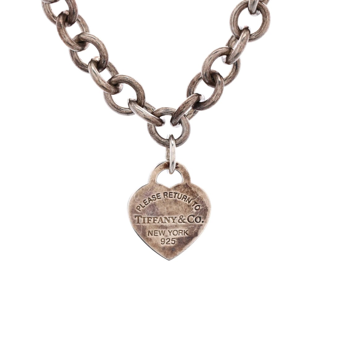 Return to Tiffany sterling silver necklace with heart tag choker: Return to Tiffany sterling silver necklace with heart tag choker Sterling silver Return to Tiffany heart tag choker necklace with a classic, timeless design. The intricate details and subtle wear