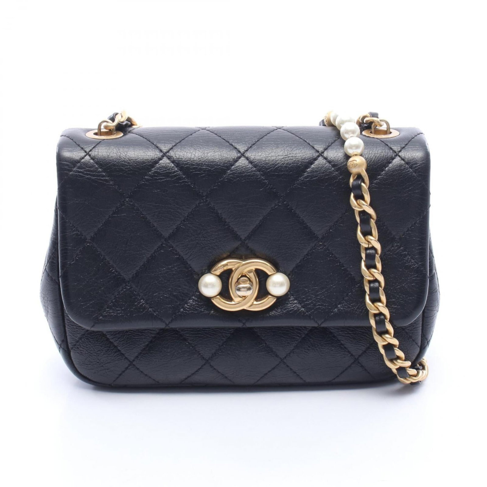 Chanel Handbag Shoulder Bag Leather: Chanel Handbag Shoulder Bag Leather Black leather Chanel shoulder bag with gold hardware, measuring 13.5cm x 18.5cm x 5cm. This classic design showcases the timeless elegance of the iconic brand. The
