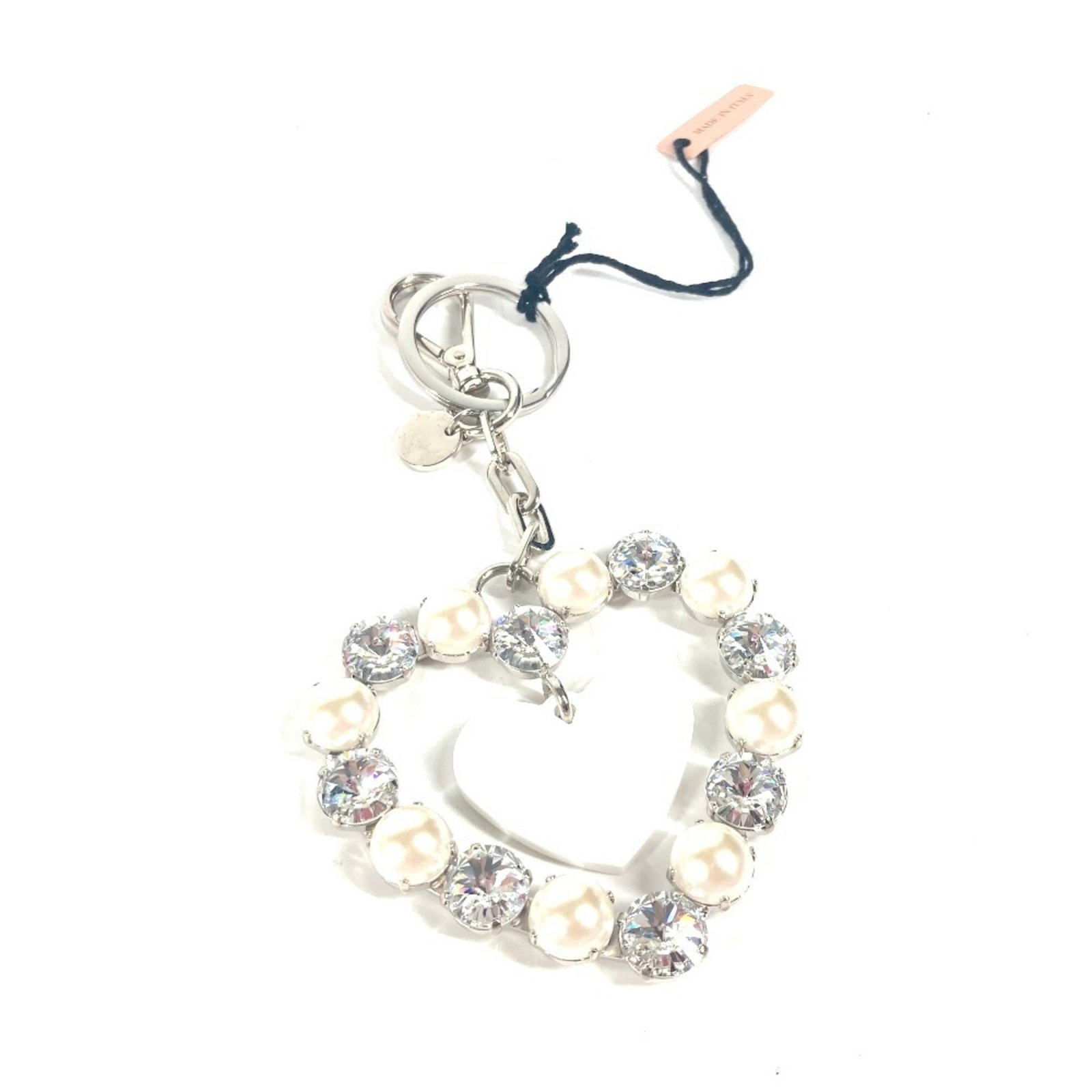 Keyring Metal Miu: Keyring Metal Miu Silver Metal Miu Miu Keyring comes with box and dust bag. The keyring is made from metal, available in silver color. It bears a signature. Item Specifics: Brand: Miu Miu Type: