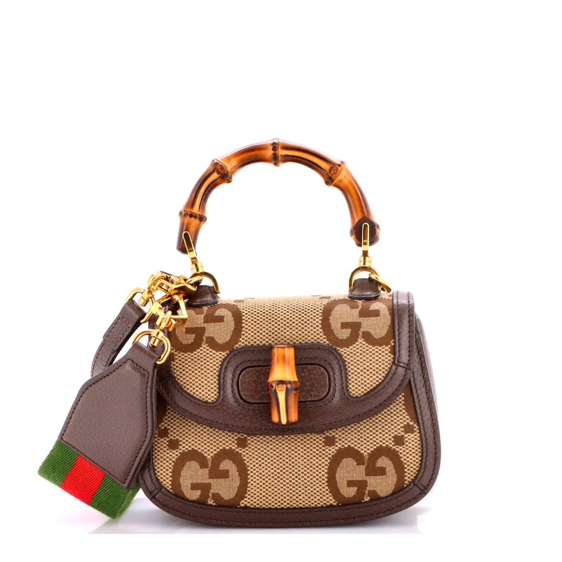 Gucci 1947 bamboo top bag mini jumbo handle GG canvas: Gucci 1947 bamboo top bag mini jumbo handle GG canvas The Gucci 1947 Bamboo Top Handle Bag in brown canvas features the iconic GG logo, making it a stylish and timeless accessory. Measuring just 5" ta