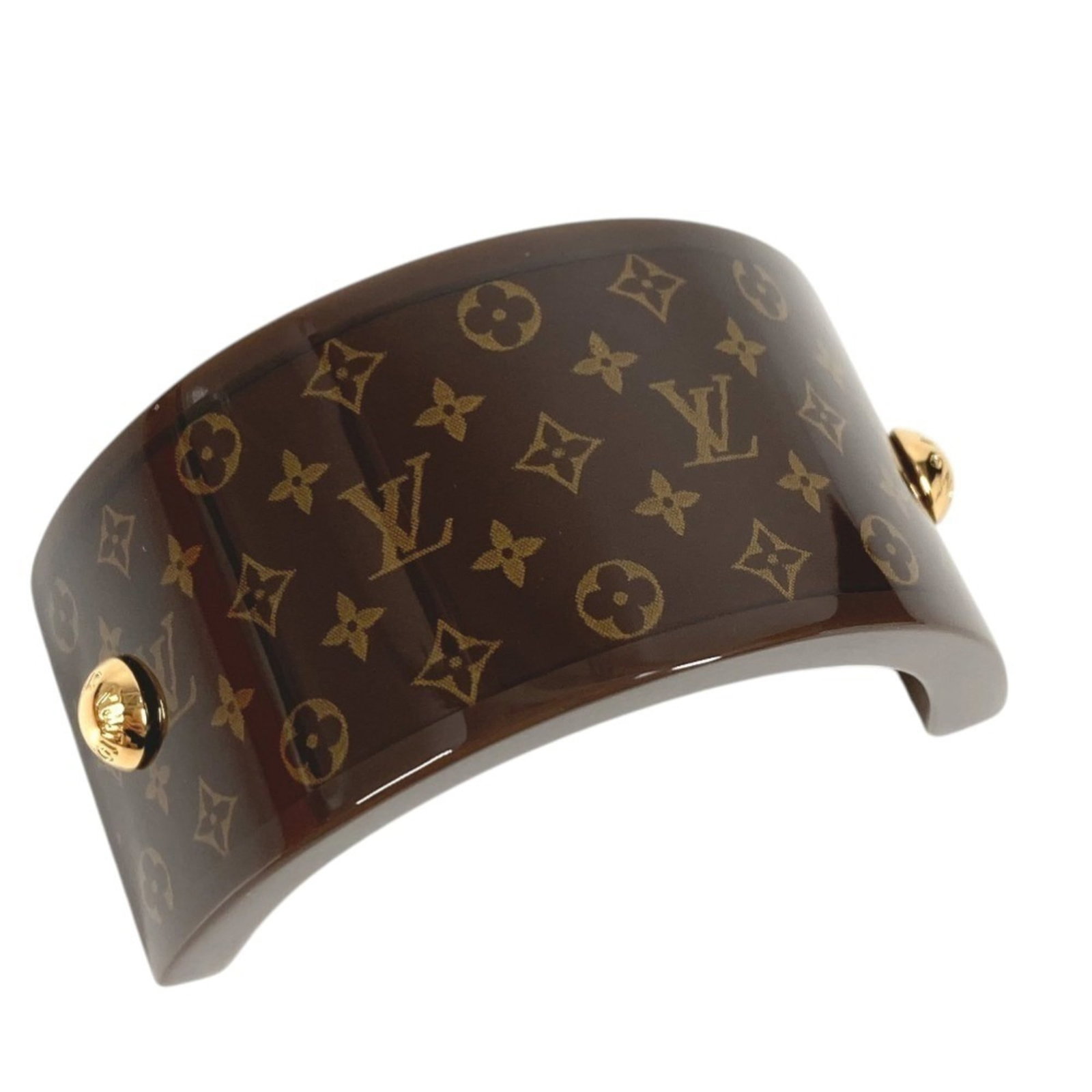 Hair Pin Resin Louis Vuitton: Hair Pin Resin Louis Vuitton Resin Louis Vuitton hair pin with intricate details, crafted in Italy. Measuring 3.2cm x 6.5cm, this brown resin piece features the iconic M03551 design. A unique accessor