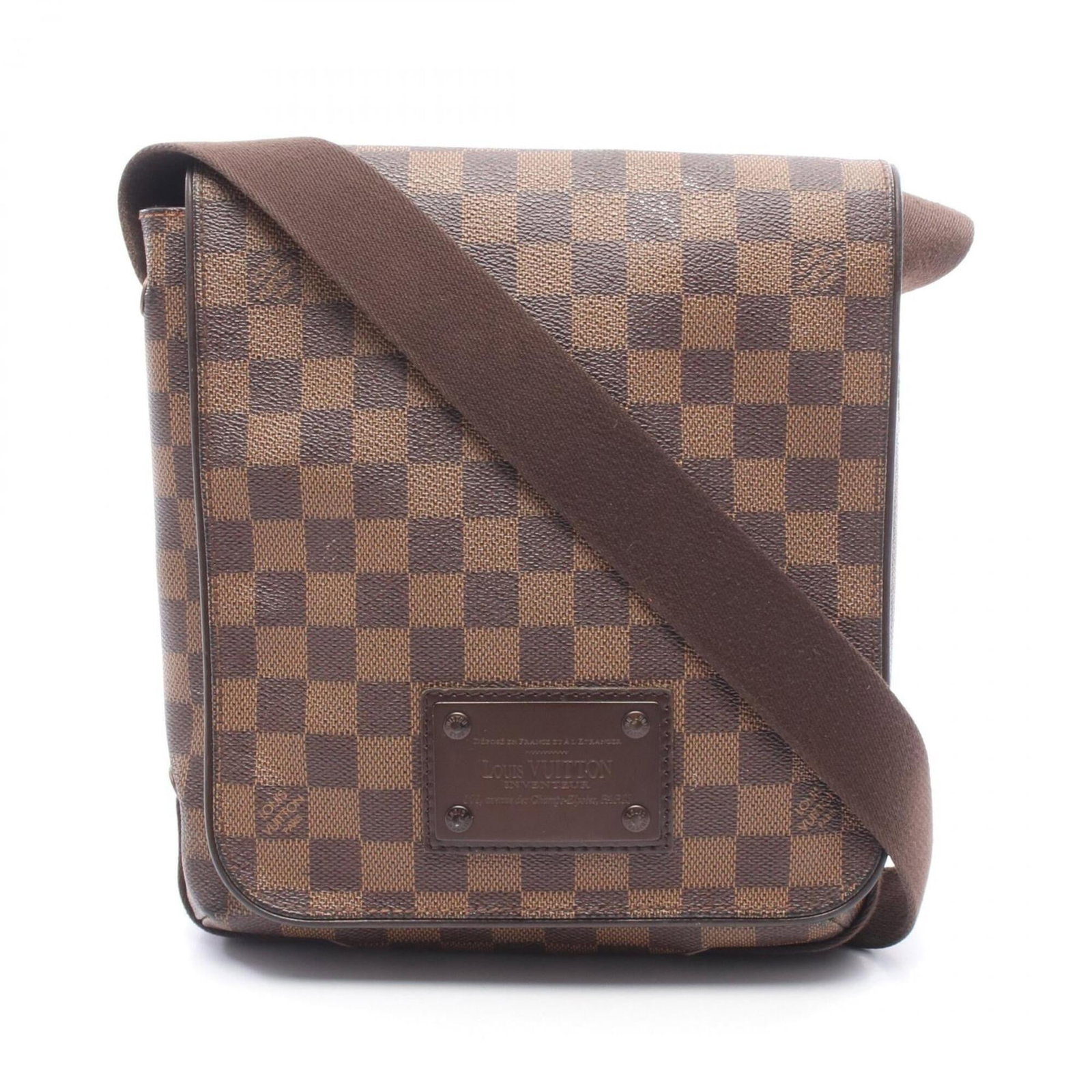 Canvas Leather coated shoulder bag from Louis Vuitton: Canvas Leather coated shoulder bag from Louis Vuitton Canvas Leather Coated Shoulder Bag from Louis Vuitton, featuring coated canvas and leather construction in a classic brown Damier design.