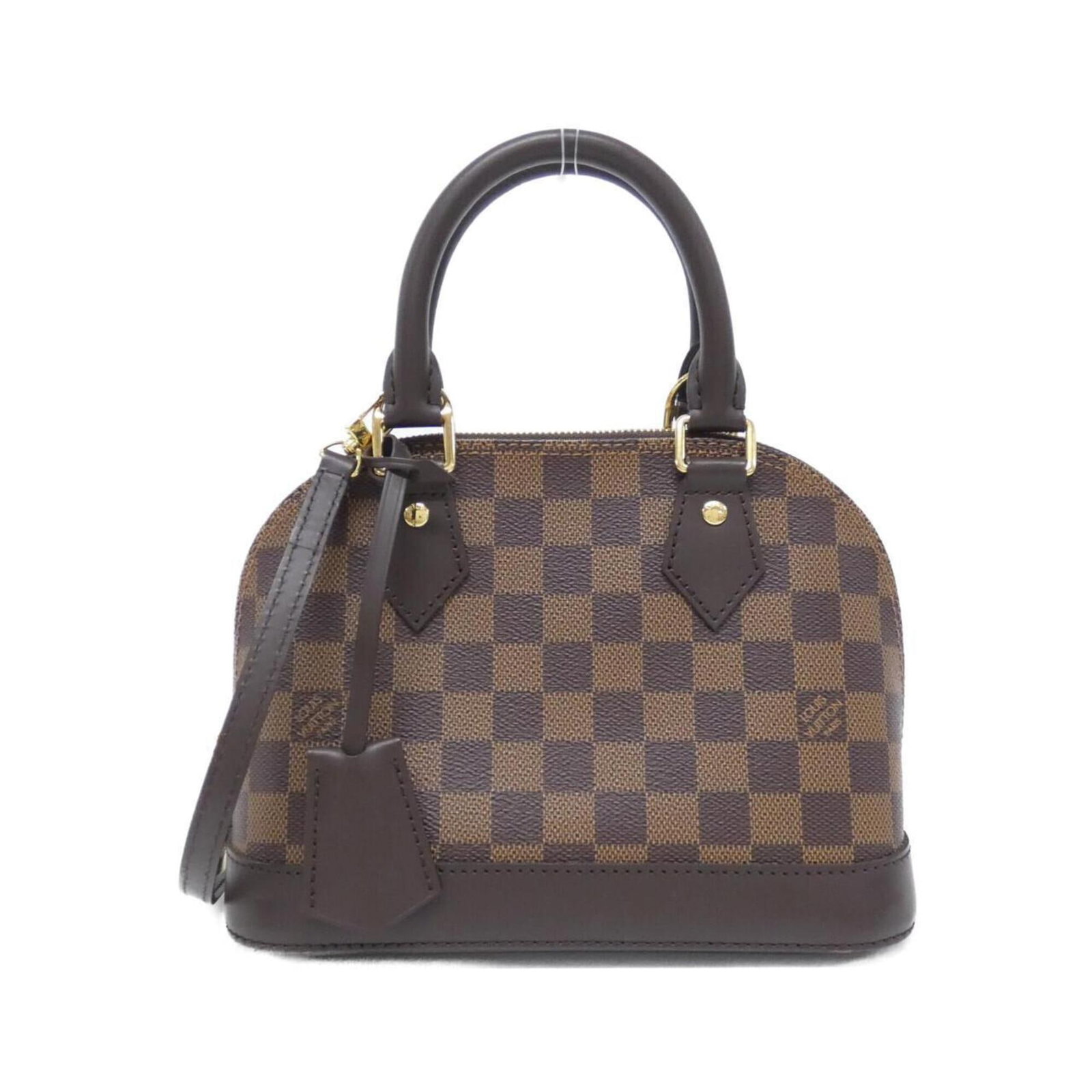 Canvas Coated Louis Vuitton Handbag: Canvas Coated Louis Vuitton Handbag Canvas Coated Louis Vuitton Handbag in Brown, featuring a classic design with a coated canvas material and signature details. This stylish handbag measures 17cm x