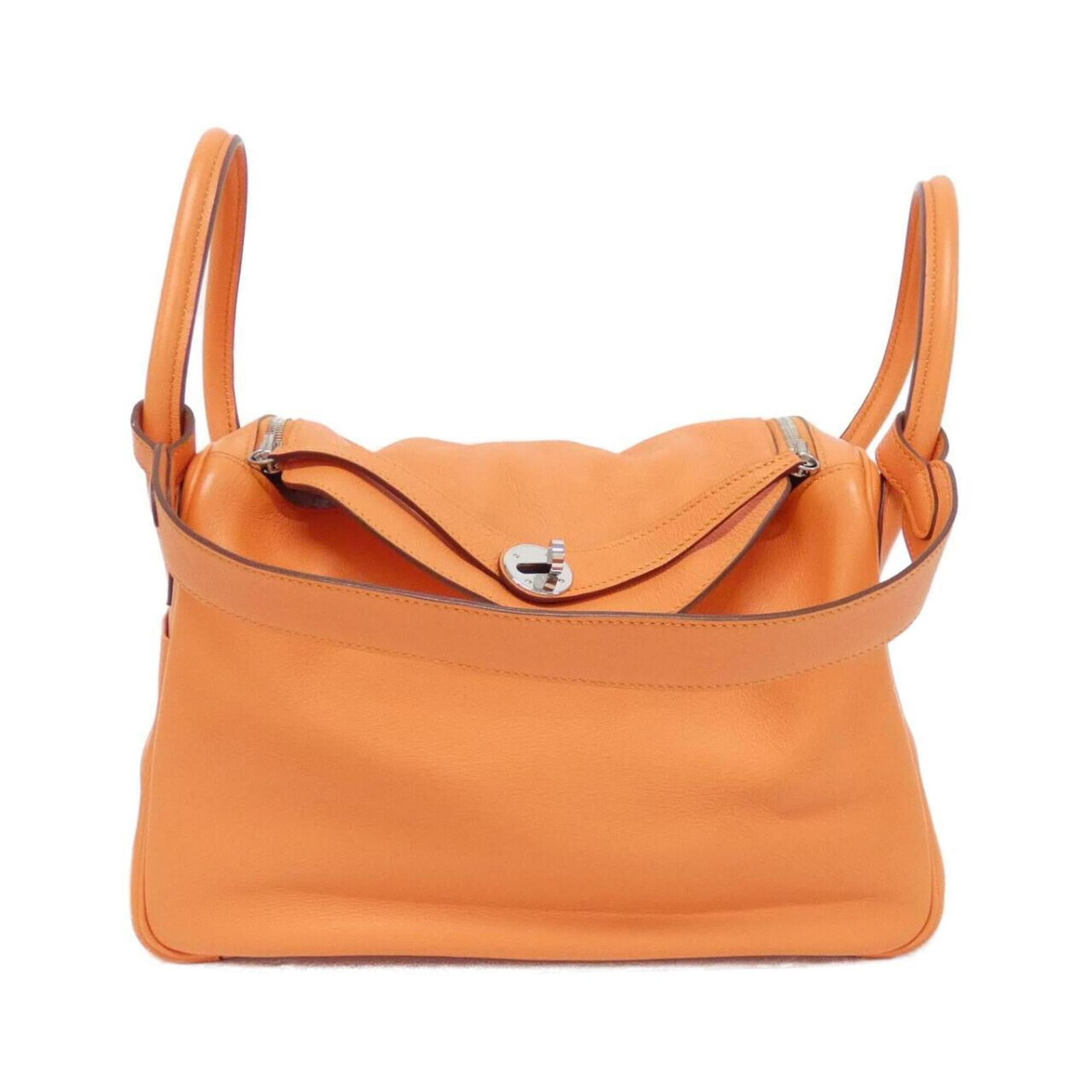 Hermes leather swift shoulder bag: Hermes leather swift shoulder bag Swift leather craftsmanship meets timeless style in this sleek Hermes shoulder bag, boasting a vibrant mango hue and silver hardware accents. With its compact size an