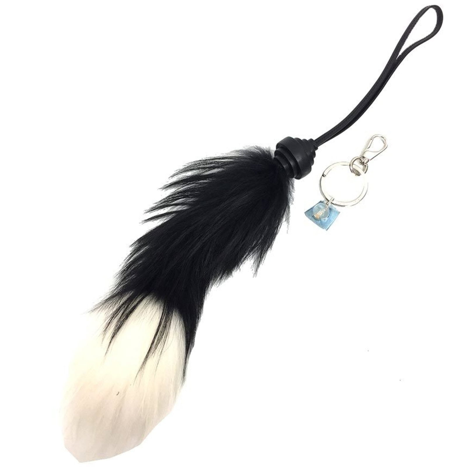 Keyring leather metal fur Tod's: Keyring leather metal fur Tod's Keyring leather metal fur Tod's features a unique blend of luxurious materials, including high-quality leather and genuine fur, combined with metallic accents for added