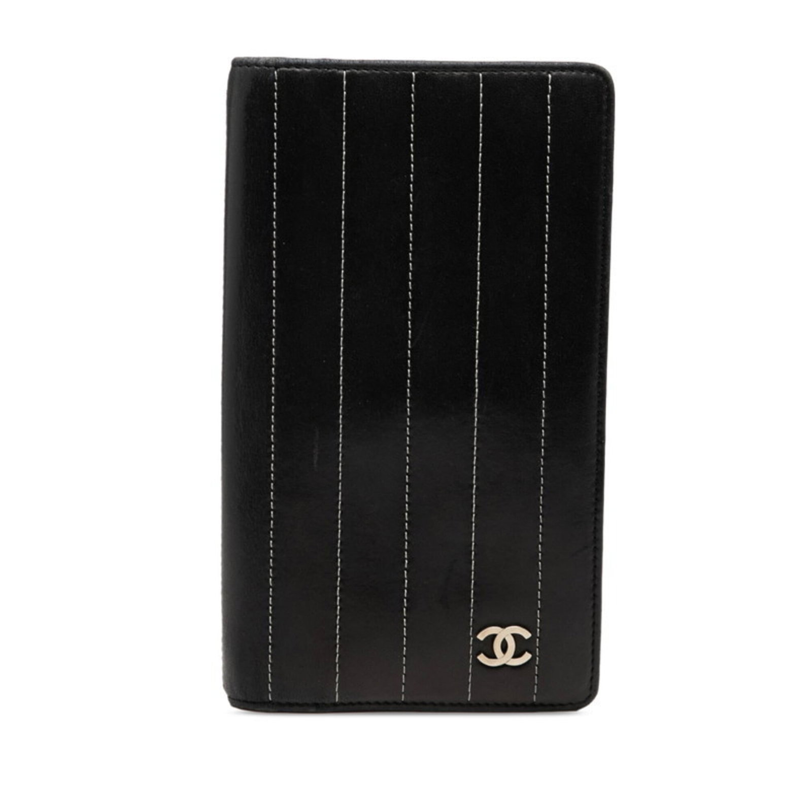 Chanel Long Wallet (Bi-Fold) Leather: Chanel Long Wallet (Bi-Fold) Leather Chanel's iconic long wallet in black lambskin leather, featuring a sleek bi-fold design that adds a touch of sophistication to any outfit. Measuring 18.5cm x