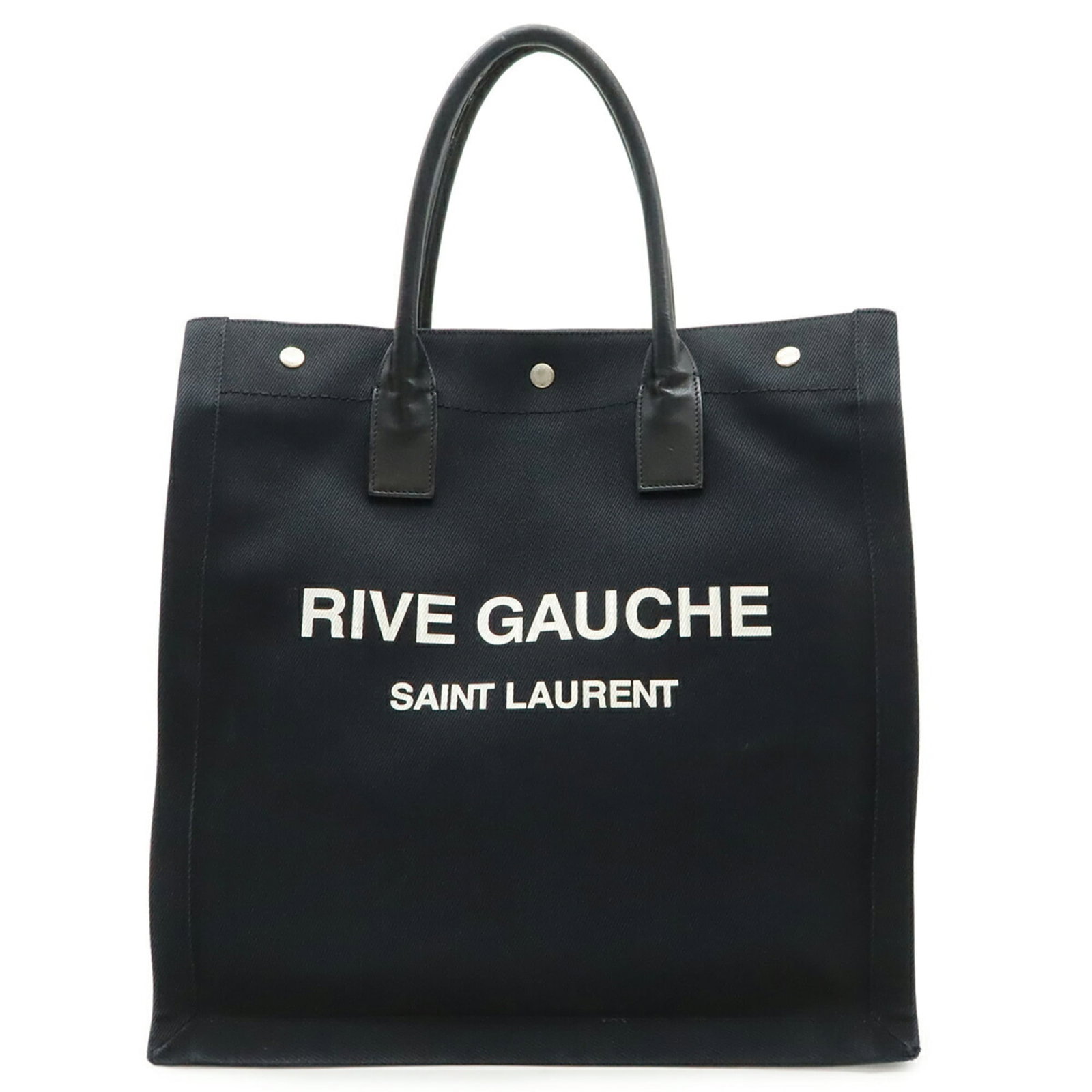 Yves Saint Laurent Tote Bag Canvas Leather: Yves Saint Laurent Tote Bag Canvas Leather Canvas and leather combine in this sleek Yves Saint Laurent tote bag, measuring 37.5cm x 36.5cm x 18cm. The black canvas exterior features a substantial