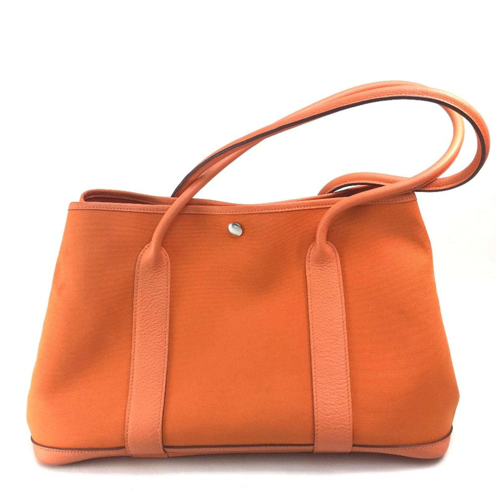 Hermes Tote Bag Other: Hermes Tote Bag Other Orange Herm?s Tote Bag with Classic Design. This vibrant orange tote bag features the iconic Herm?s style, measuring 38cm x 25cm x 15cm in size. Its bright color and timeless des