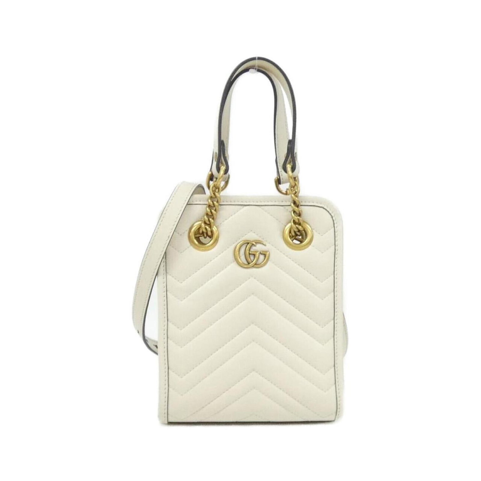 Gucci Handbag Leather: Gucci Handbag Leather White Gucci leather handbag with gold hardware, measuring 19cm x 16cm x 7cm. Includes dust bag and shoulder strap for added convenience. A classic design from the renowned luxury