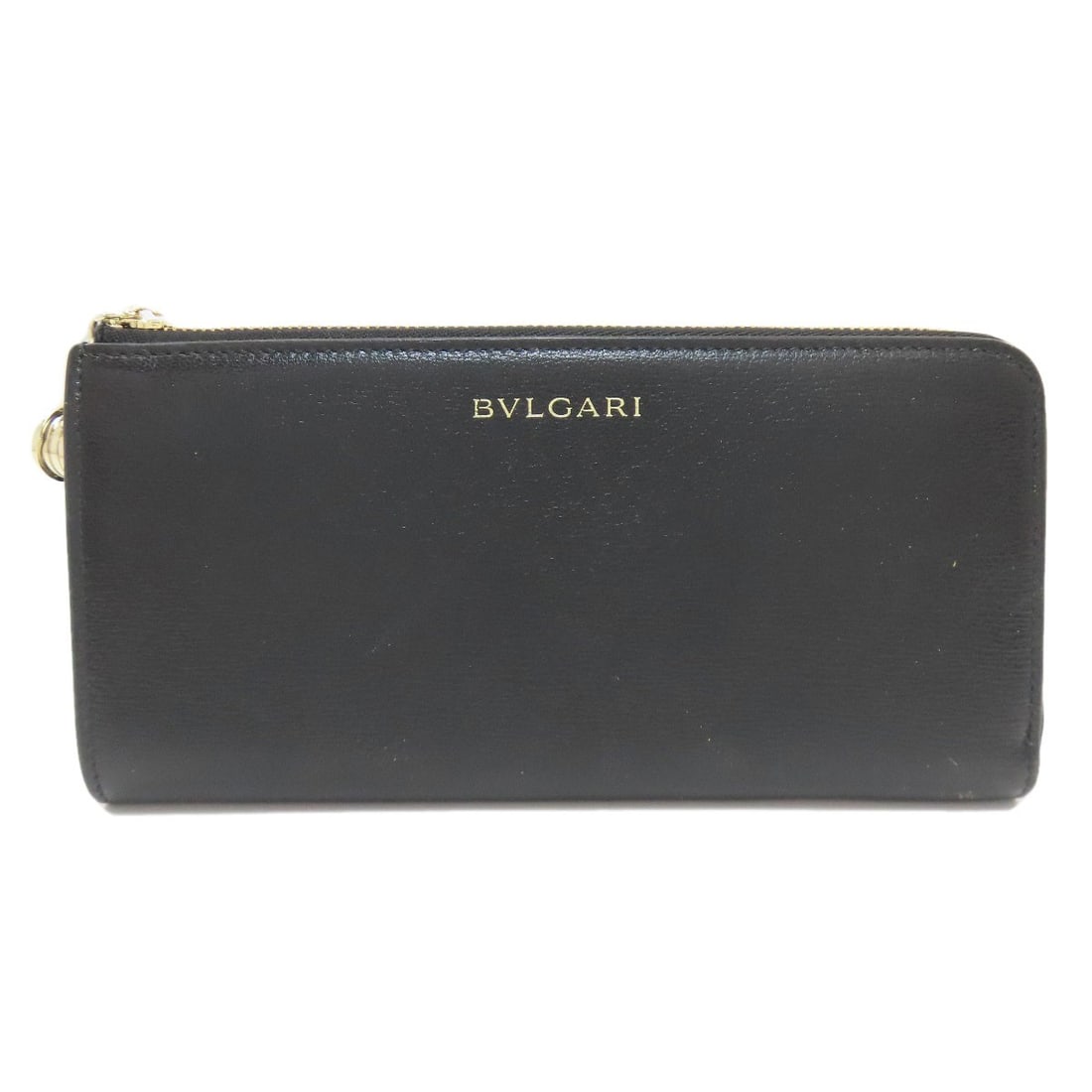 Bvlgari B-Zero1 Charm Long Wallet (With Coin Pocket) Leather: Bvlgari B-Zero1 Charm Long Wallet (With Coin Pocket) Leather Black leather Bvlgari B-Zero1 charm long wallet with coin pocket, featuring the iconic brand's signature style and design. This sleek and
