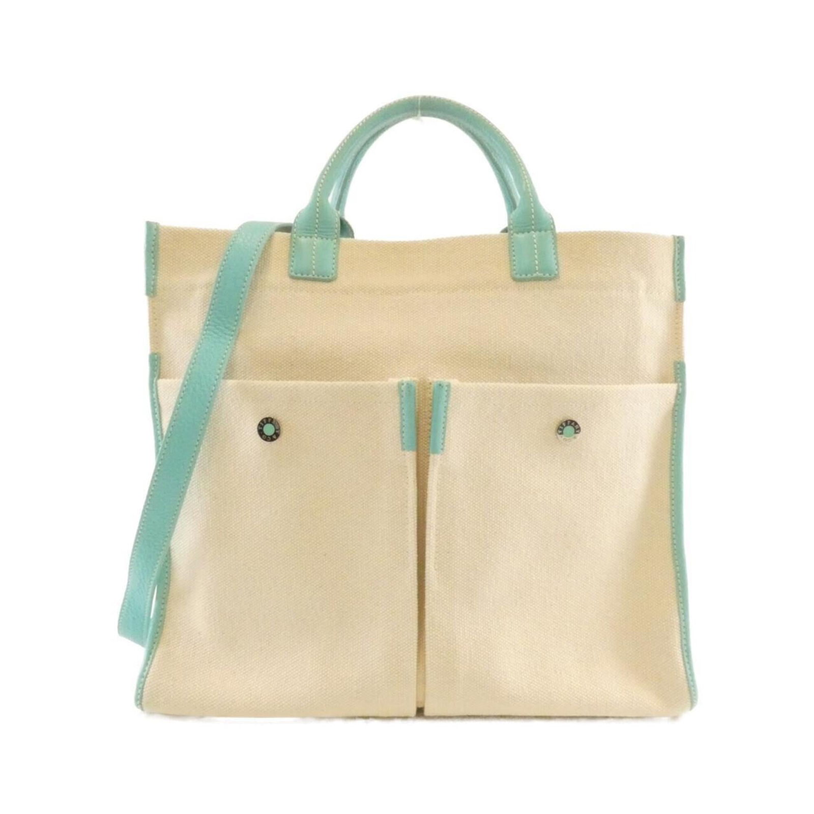 Canvas Leather Handbag Tiffany: Canvas Leather Handbag Tiffany Canvas Leather Handbag in Beige and Tiffany Blue. This canvas leather handbag features a unique combination of beige and Tiffany blue colors, adding a touch of elegance 