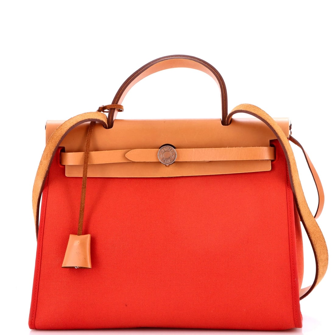 Hermes Herbag Zip Leather and Toile 31: Hermes Herbag Zip Leather and Toile 31 The Herm?s Herbag Zip Leather and Toile 31 features a striking red exterior with a classic shoulder bag design, complete with a palladium hardware clochette and 