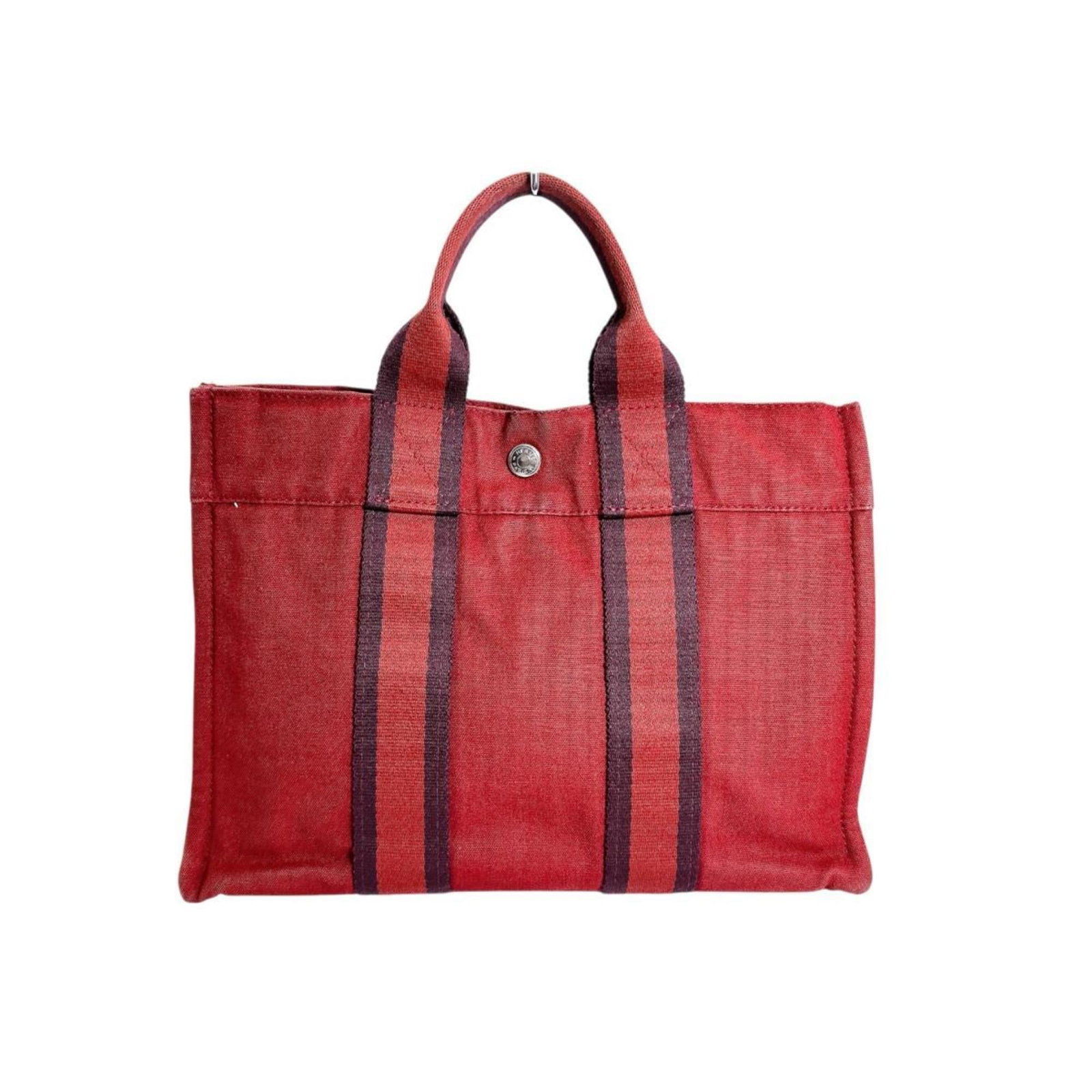 Handbag Canvas by Hermes: Handbag Canvas by Hermes Canvas Handbag by Hermes, Red Color. Made from high-quality canvas material, this handbag features a striking red color and measures 22cm x 30cm x 8.5cm in size. A canvas