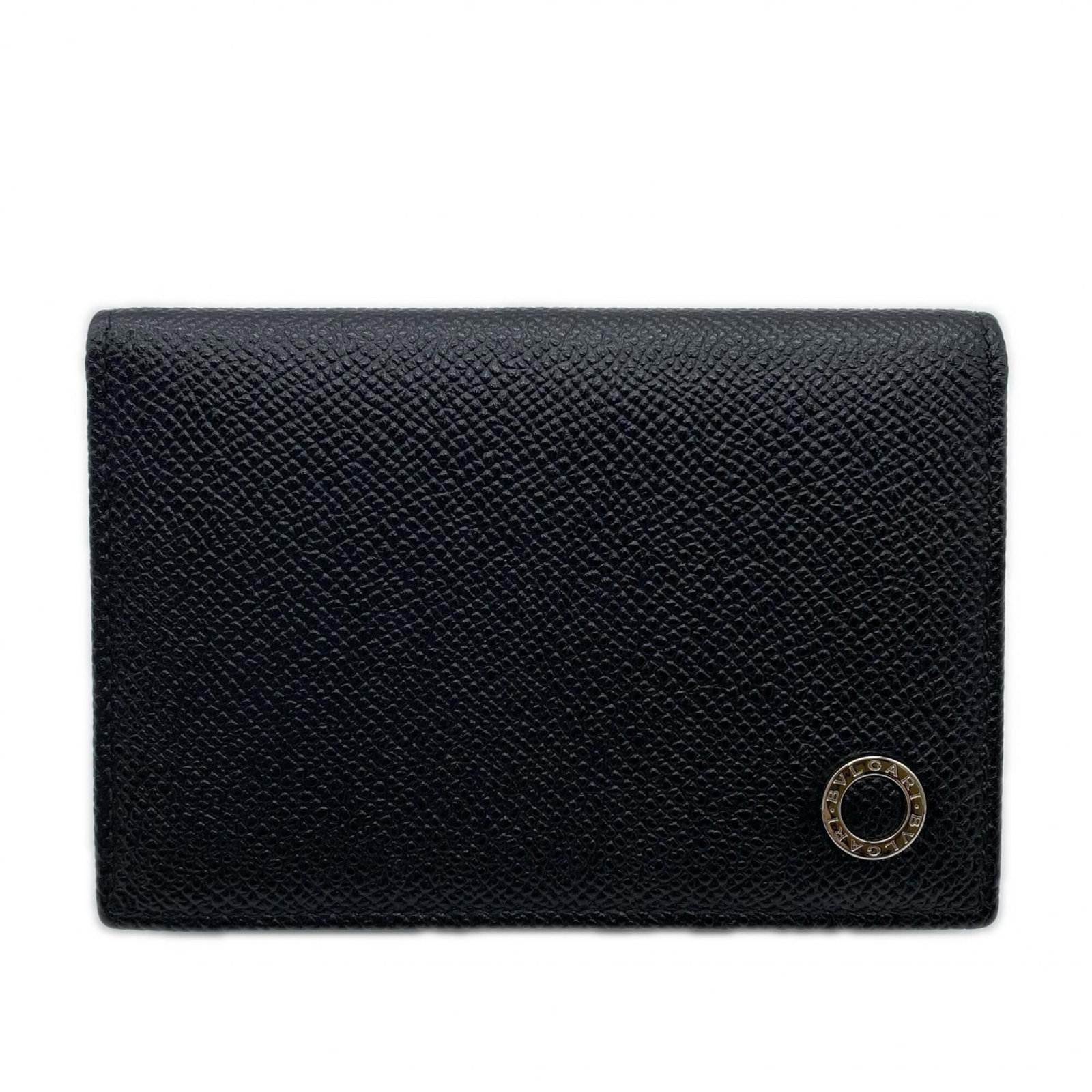 Card case Leather from Bvlgari: Card case Leather from Bvlgari Calfskin leather card case from Bvlgari, featuring a sleek black design and RFID-blocking closure. The compact size measures 7.5cm x 11.5cm x 1.5cm, making it a convenie
