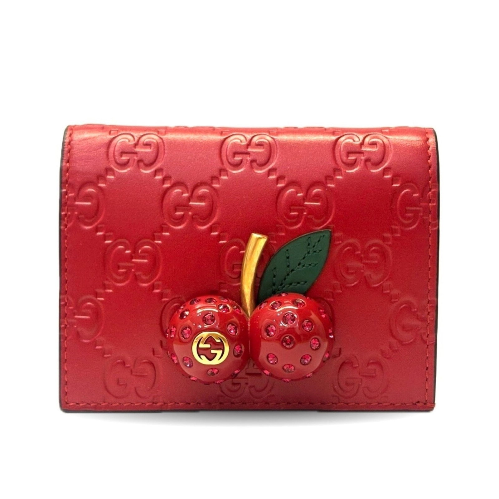 Gucci Wallet (Bi-Fold) Leather: Gucci Wallet (Bi-Fold) Leather Cherry red leather adds a pop of color to this bi-fold Gucci wallet, with its classic design and sleek silhouette. Made from high-quality materials, the wallet measures 