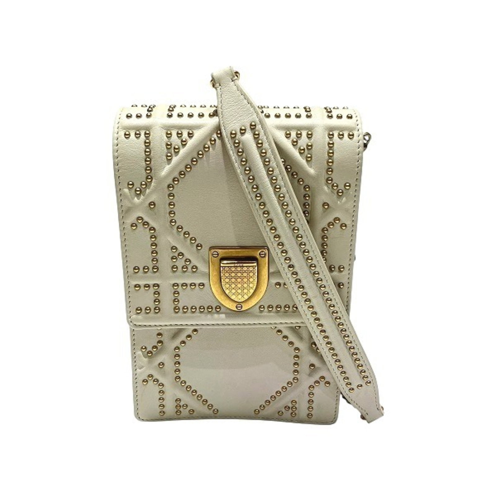 Handbag Shoulder Christian Dior Leather: Handbag Shoulder Christian Dior Leather This luxurious Christian Dior leather shoulder bag boasts an elegant ivory color and sleek design. Measuring 17cm x 11.5cm x 4.5cm, it features a sturdy magnet
