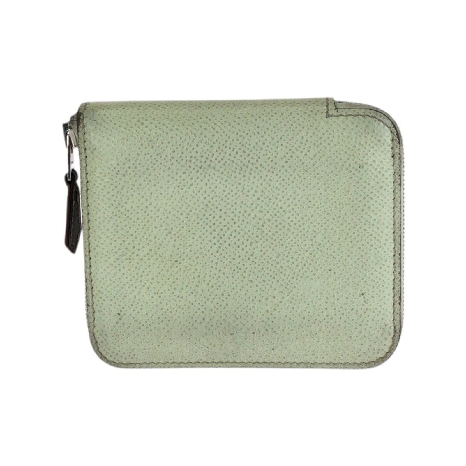 Epsom silk leather coin purse case Hermes: Epsom silk leather coin purse case Hermes Epsom silk leather coin purse case from Hermes, featuring a light green color and compact size. Made from high-quality Epsom leather and silk, this elegant